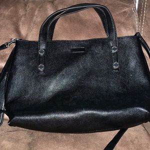 Calvin Klein handbag wallet attached.